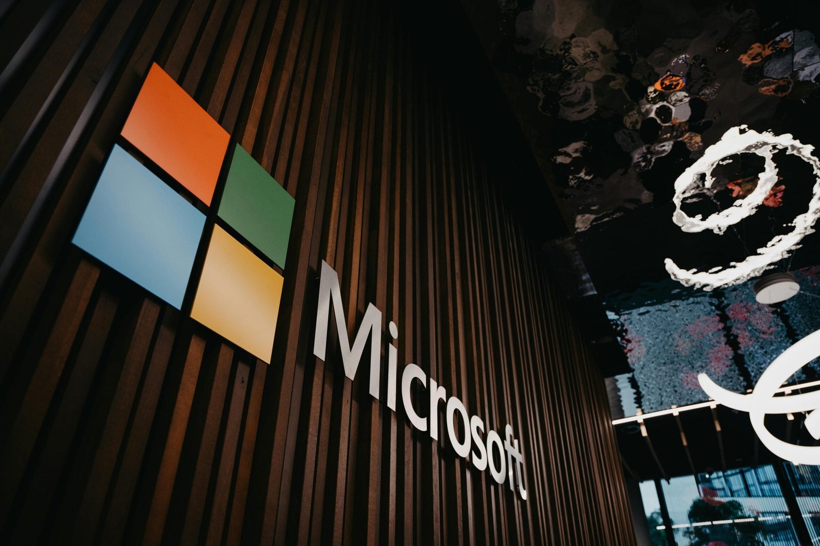 Microsoft Xbox layoffs 2025 logo displayed inside company office building